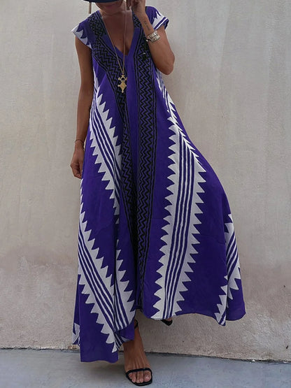 Vestido Boho Chic con Escote en V Profundo – Elegancia que Fluye con Cada Paso